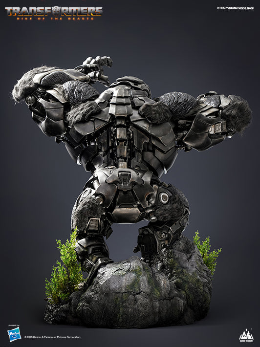 Back view of Optimus Primal-Beast Mode collectible with dynamic pose