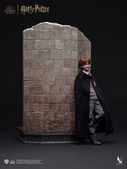 Ron Weasley 1/6 Scale Figure laying on the wall