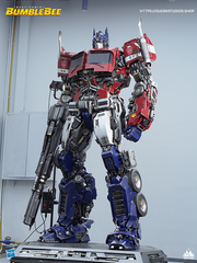 Statue of Optimus Prime from Queen Studios, capturing his iconic stance.